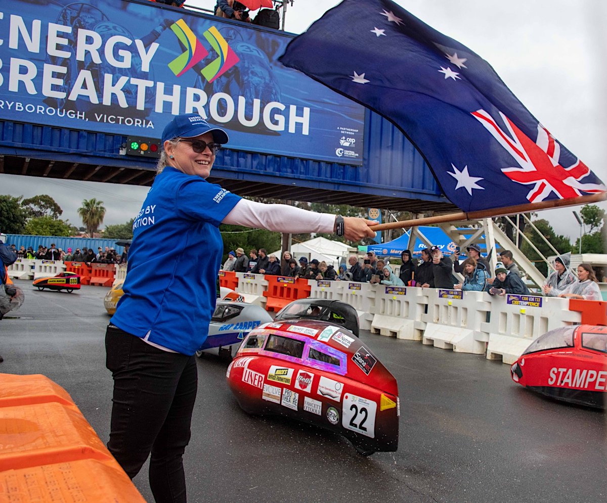 The national flag is waved to start the school student's Human Powered (HPV) and Electric Vehicles (EEV) endurance trial at the Energy Breakthrough - Maryborough, Victoria.