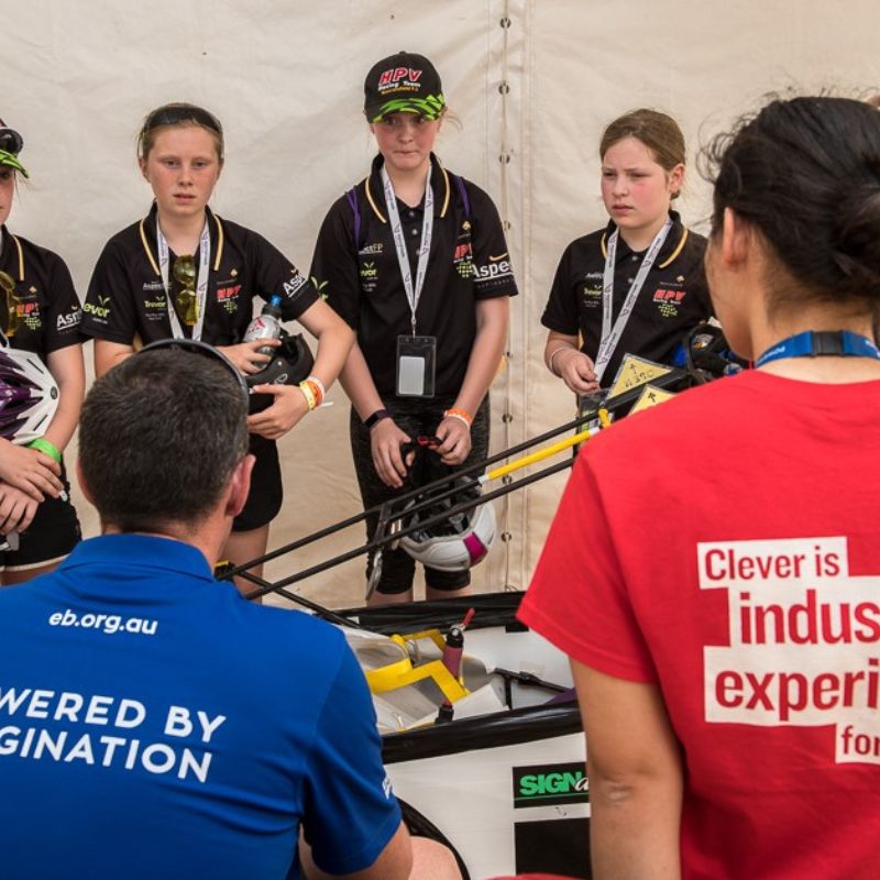 Energy Breakthrough Volunteers listening to students present