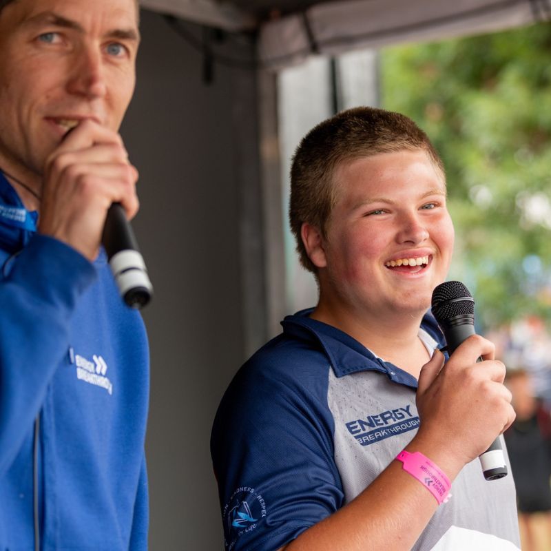 Energy Breakthrough Volunteers on a microphone